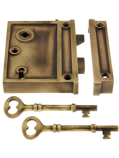Solid Brass Vertical Rim Lock in Antique Brass.